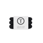 Set of jet black hair ties with a Teleties branded card on a white background. Available at Be Charmed