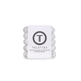 A pack of TIny Coonut White Teleties hair ties with a strong grip, presented in a clear package with a white label featuring the brand's logo.