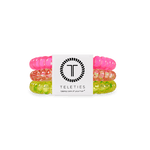 Tropical Punch Teleties Hair Ties with strong grip, waterproof & no crease—available at Be Charmed.