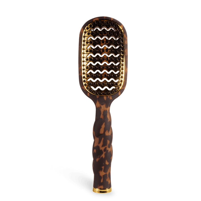 Teleties Vented Hairbrush with tortoiseshell handle on a transparent background. Available at Be Charmed