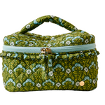 Green floral-patterned cosmetic bag with a gold zipper on a beige background. Available at Be Charmed