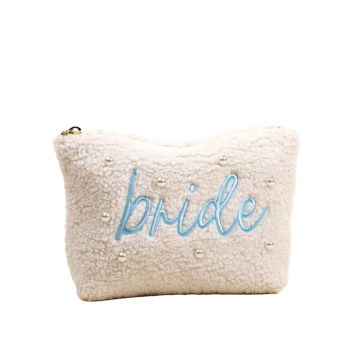 White fluffy pouch with 'bride' embroidered in blue on a beige background. Available at Be Charmed