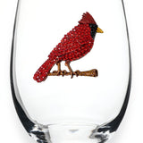 A premium handcrafted stemless wine glass featuring a sparkling jeweled rhinestone cardinal design, available at Be Charmed.