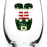 A premium handcrafted stemless wine glass featuring a playful jeweled rhinestone elf feet design, available at Be Charmed.