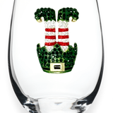 A premium handcrafted stemless wine glass featuring a playful jeweled rhinestone elf feet design, available at Be Charmed.