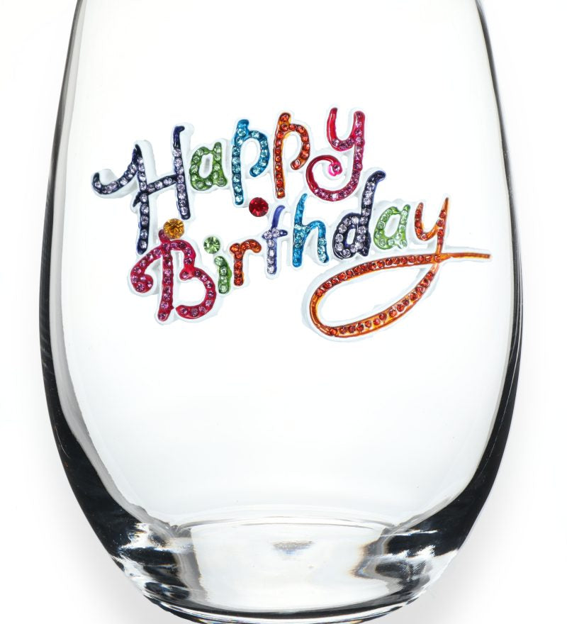 A premium handcrafted stemless wine glass featuring a sparkling jeweled rhinestone Happy Birthday design, available at Be Charmed.