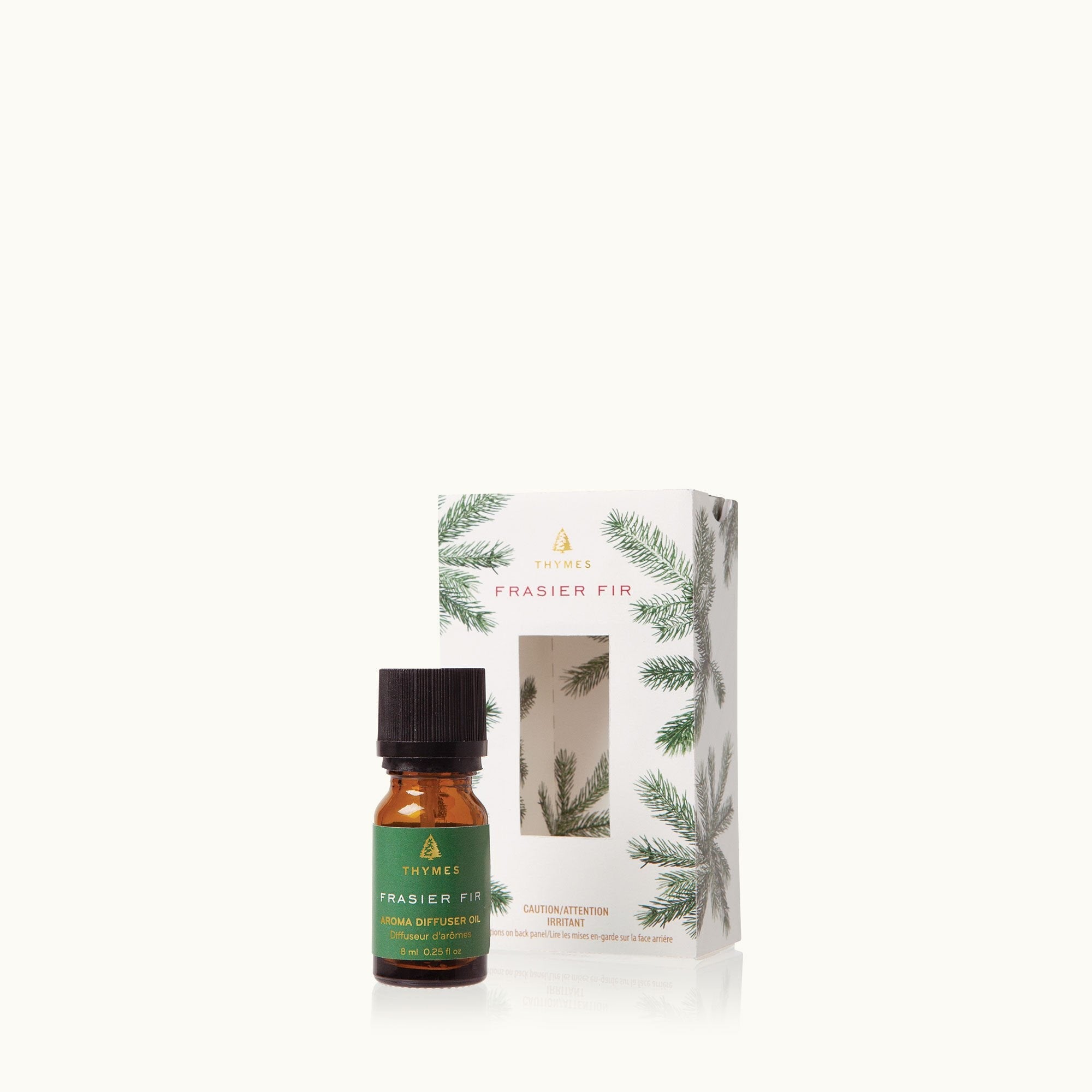 Thymes Frasier Fir Diffuser Oil to refill diffusers with festive pine fragrance. Available at Be Charmed.