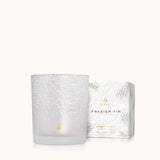 Thymes Frasier Fir Flocked 6.5 oz Poured Candle with festive pine fragrance and decorative flocked design. Available at Be Charmed.