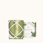 A Thymes Frasier Fir frosted plaid candle in green and white packaging, with the brand logo and product name visible. Available at Be Charmed