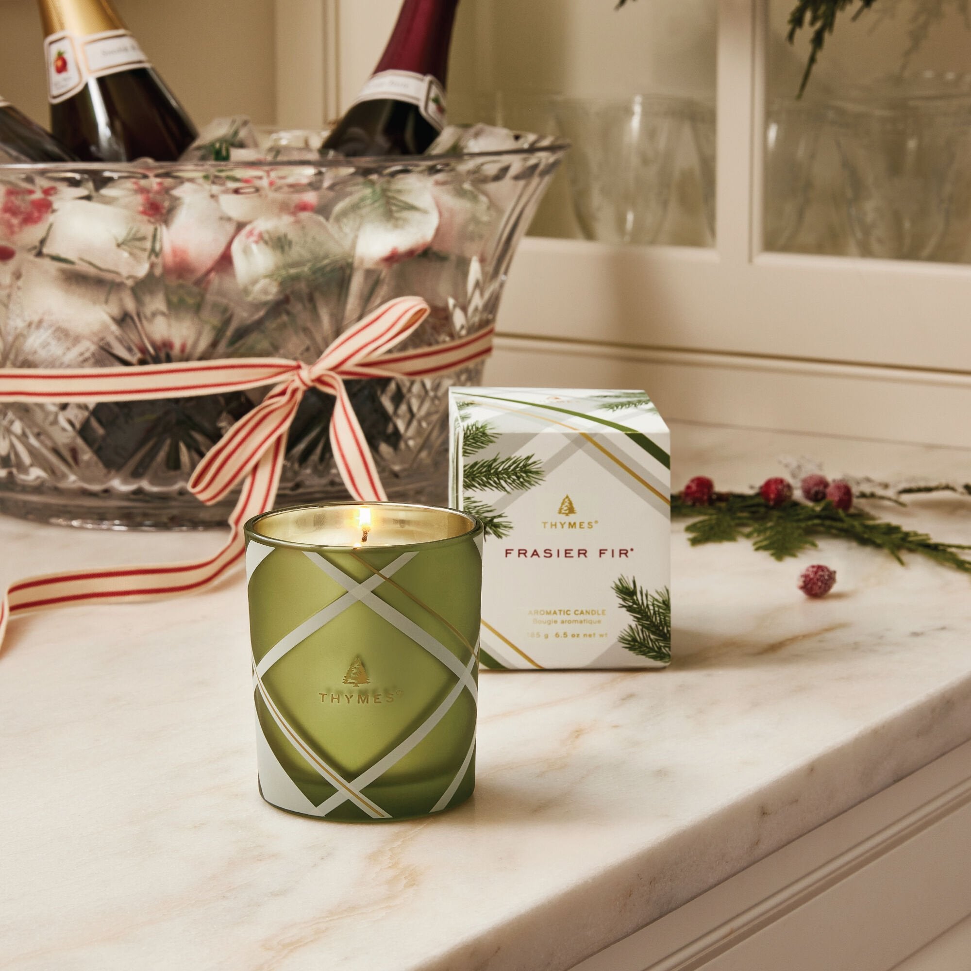 Thymes Frasier Fir Frosted Plaid 6.5oz poured candle with festive holiday scent – Available at Be Charmed