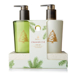 Frasier Fir sink set with green bottle and white container on a white background. Available at Be Charmed.  
