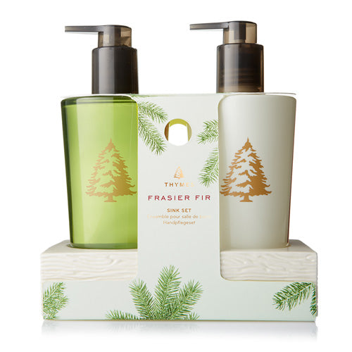 Frasier Fir sink set with green bottle and white container on a white background. Available at Be Charmed.  