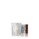 Thymes Frasier Fir candle with decorative packaging on a white background. Available at Be Charmed.  