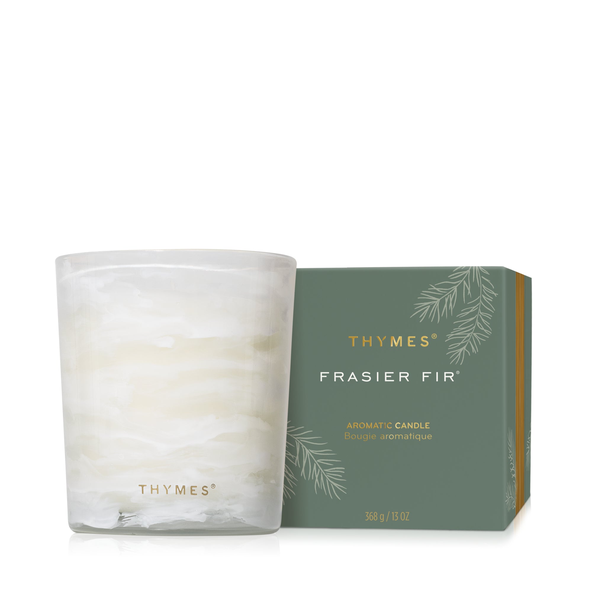 Thymes Frasier Fir candle and packaging on a white background. Available at Be Charmed