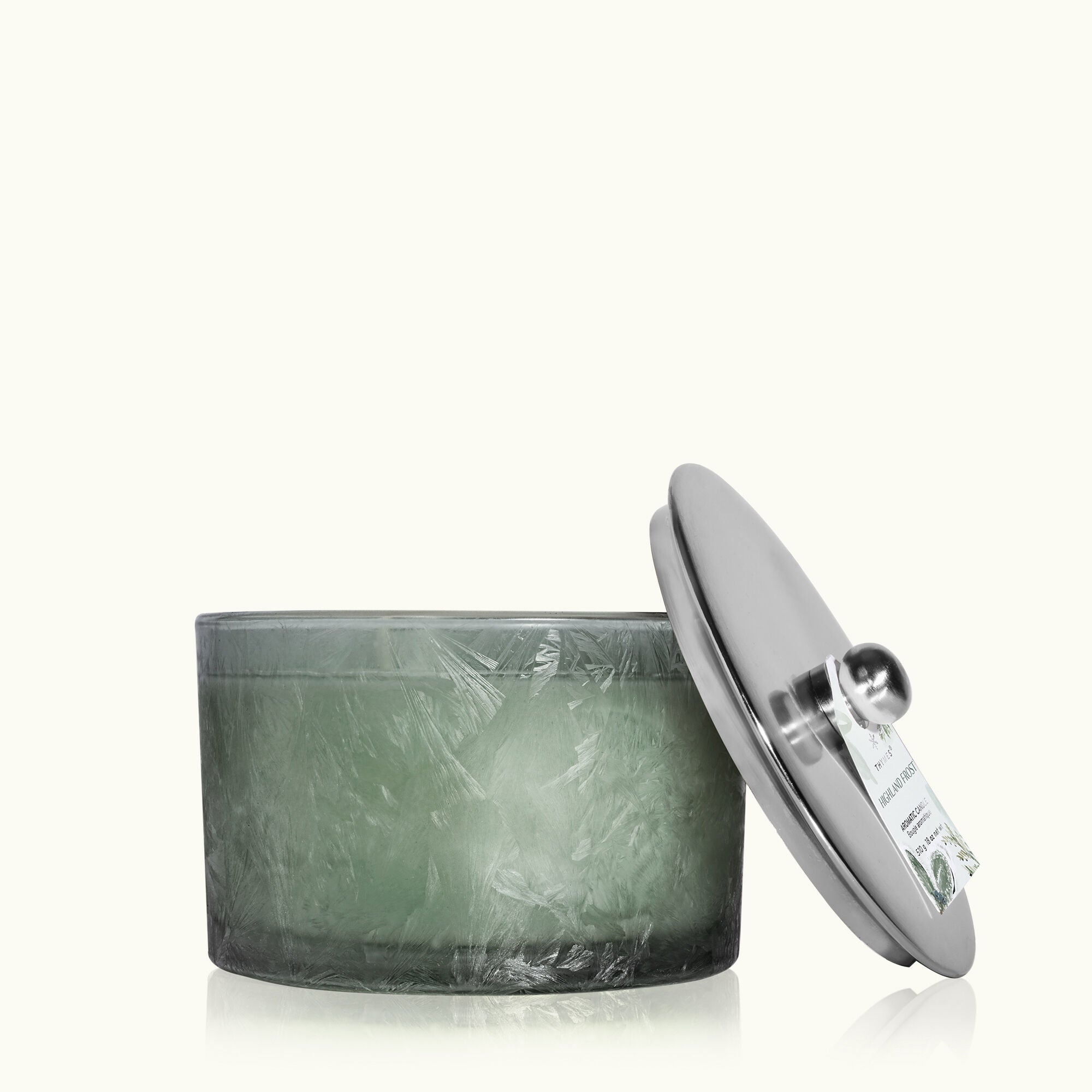 Thymes Highland Frost 3-Wick Candle with crisp, festive fragrance and long-lasting burn. Available at Be Charmed.
