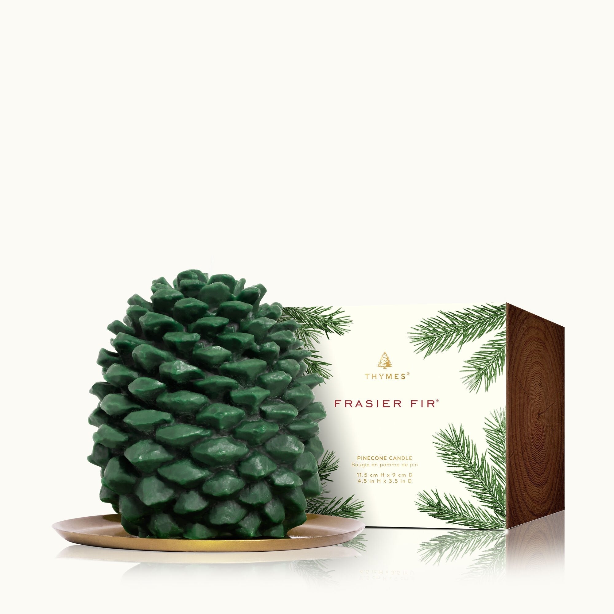 Thymes Frasier Fir Petite Kolded Pinecone Candle with festive pine fragrance in a decorative pinecone shape. Available at Be Charmed.