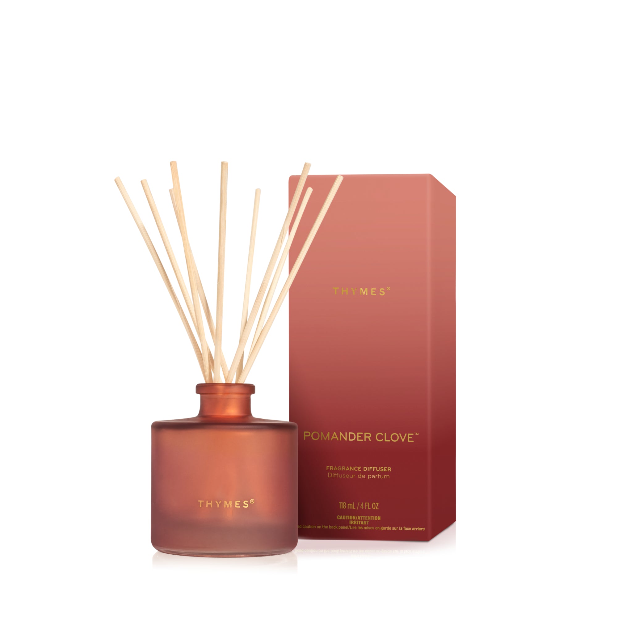 Thymes pomander clove diffuser with packaging on a white background. Available at Be Charmed