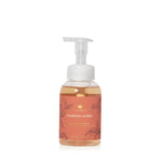Thymes Pumpkin Laurel Foaming Hand Wash with warm fall notes of pumpkin, nutmeg, clove, and orange peel in an elegant bottle—Available at Be Charmed.