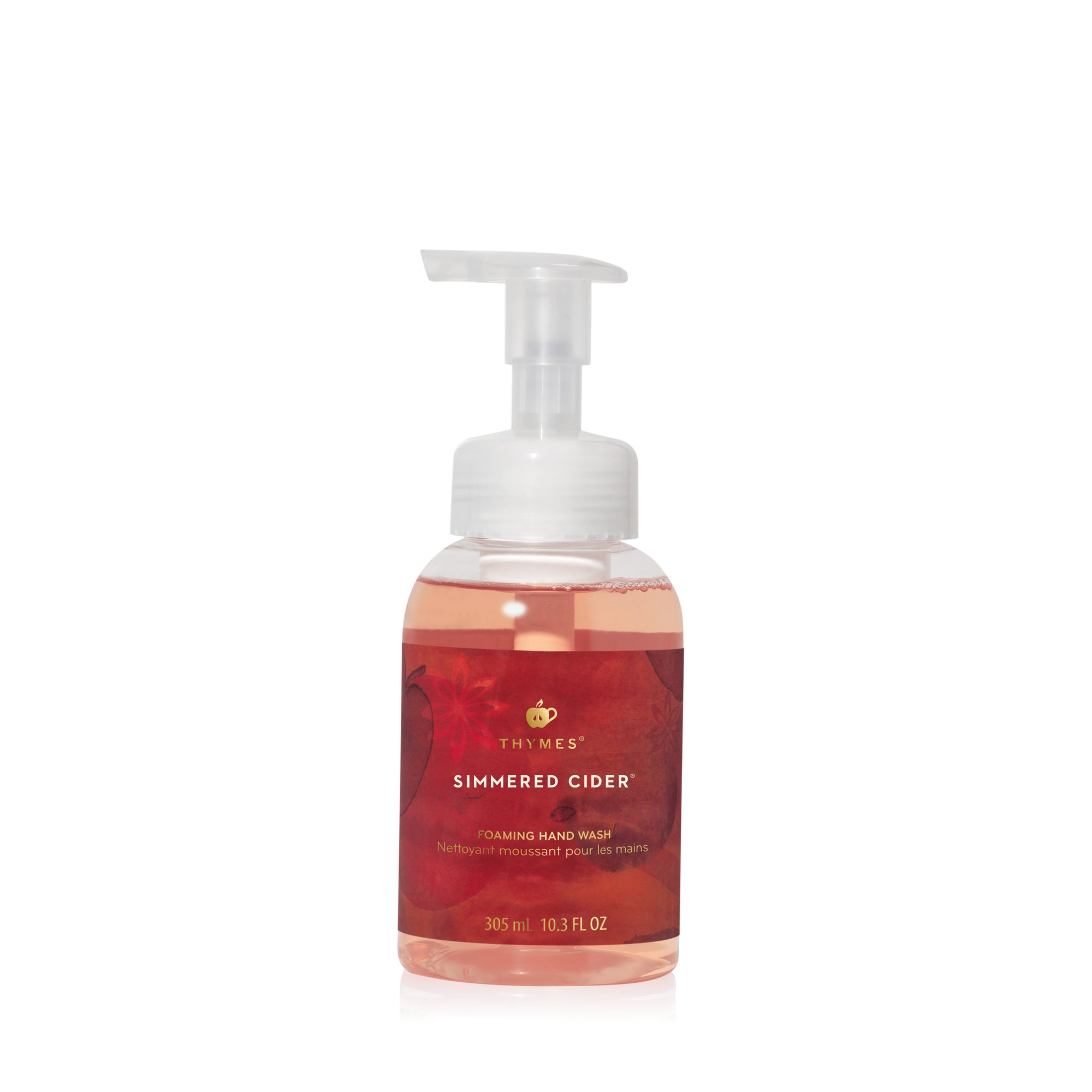  Thymes Simmered Cider Foaming Hand Wash in clear pump bottle with warm apple, clove & bourbon scent—Available at Be Charmed.