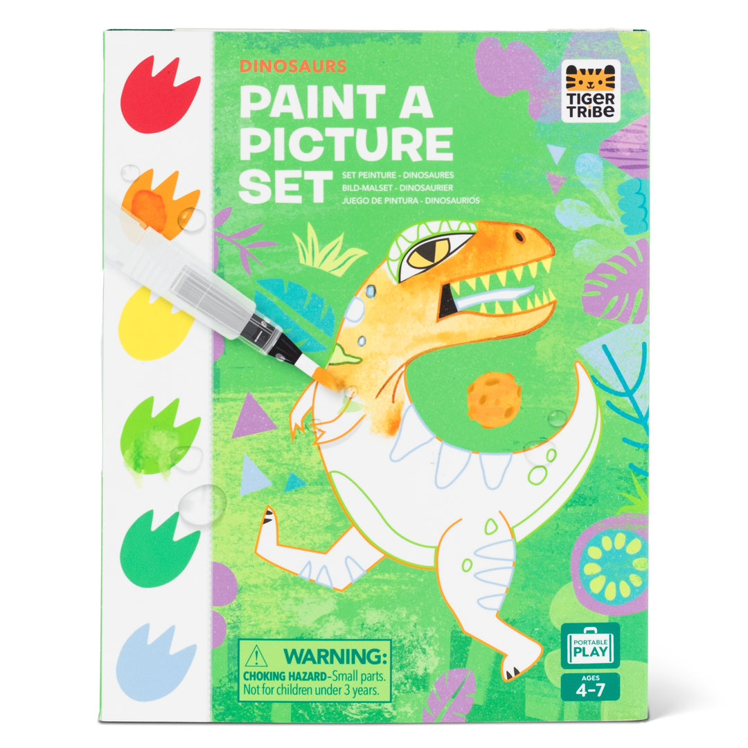 Tiger Tribe Paint a Picture Dinosaurs art kit with watercolor paints, brush, palette, and dinosaur-themed painting scenes. Creative gift for kids. Available at Be Charmed.