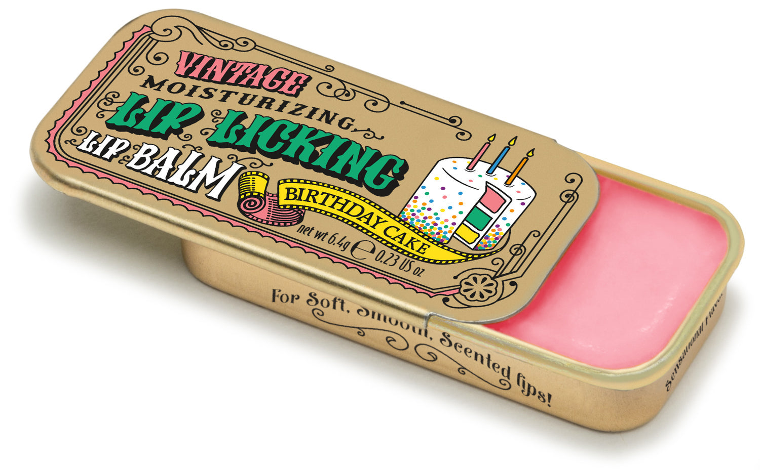 A gold vintage-style lip balm tin with 'Birthday Cake' flavor theme, featuring an illustration of a birthday cake and candles. Available at Be Charmed