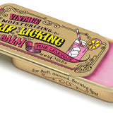 Tinte Lip Balm – Pink Lemonade flavored lip balm in vintage slider tin, hydrating and nostalgic. Available at Be Charmed.