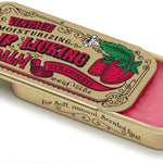 Tinte Lip Balm – Strawberry flavored lip balm in vintage slider tin, sweet, hydrating, and nostalgic. Available at Be Charmed.