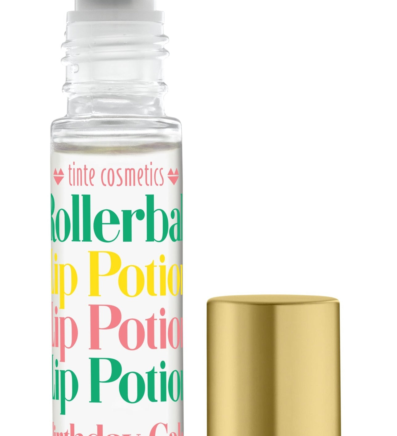 A clear rollerball lip potion bottle labeled 'Birthday Cake' with a colorful label, alongside a gold-colored lid. Available at Be Charmed