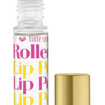 A clear rollerball lip potion bottle with pink and yellow labeling, alongside a gold-colored cap. Available at Be Charmed
