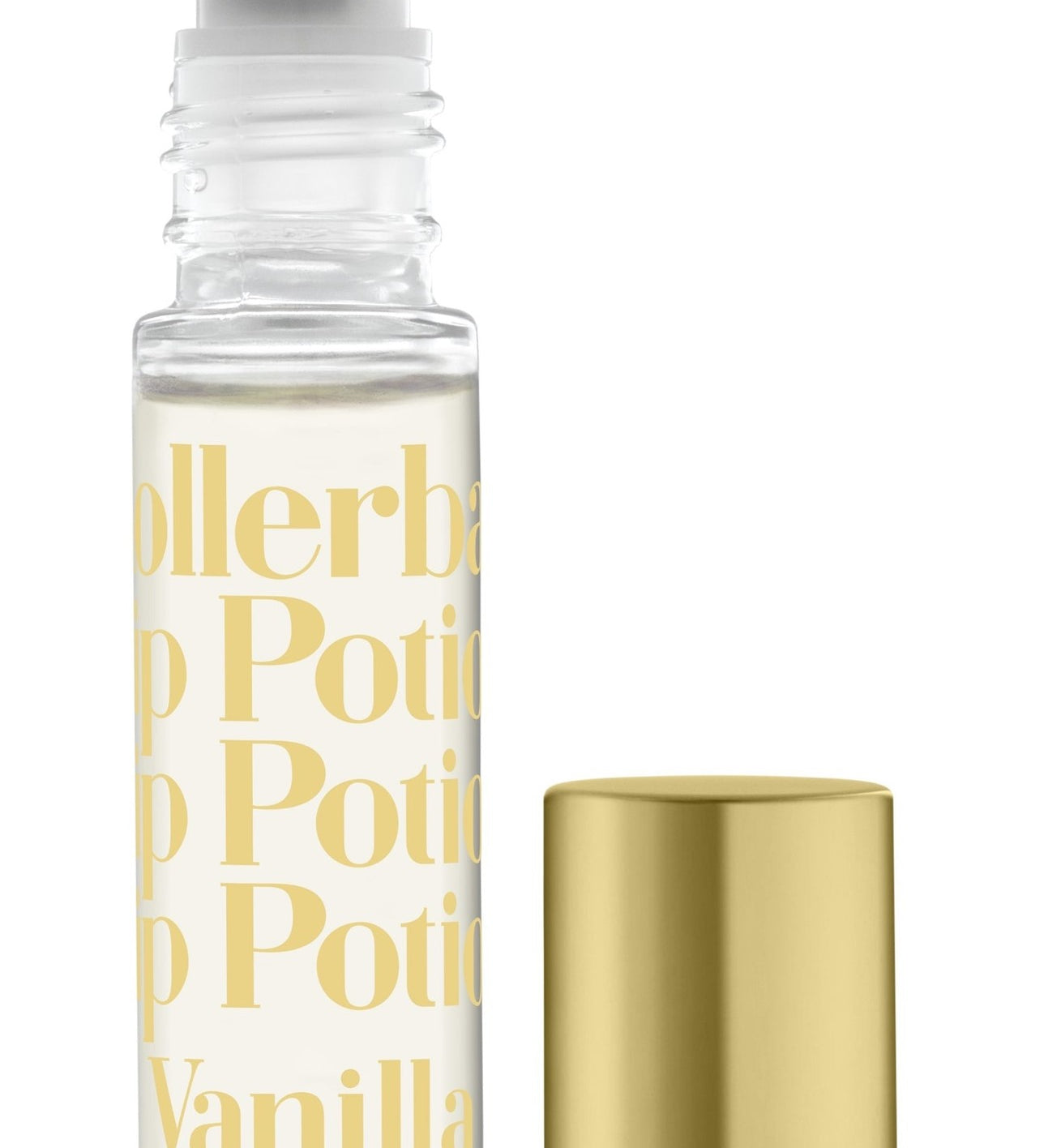 A clear rollerball lip potion bottle with 'TINTE COSMETICS' and 'KISSING POTION VANILLA' printed on it, alongside a gold-colored cap. Available at Be Charmed