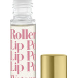 A rollerball lip potion with watermelon flavor, accompanied by its cap, displayed against a white background. Available at Be Charmed