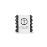 A pack of TIny Teleties hair ties in Jet Black, presented in a white box with the Teleties logo. Available at Be Charmed