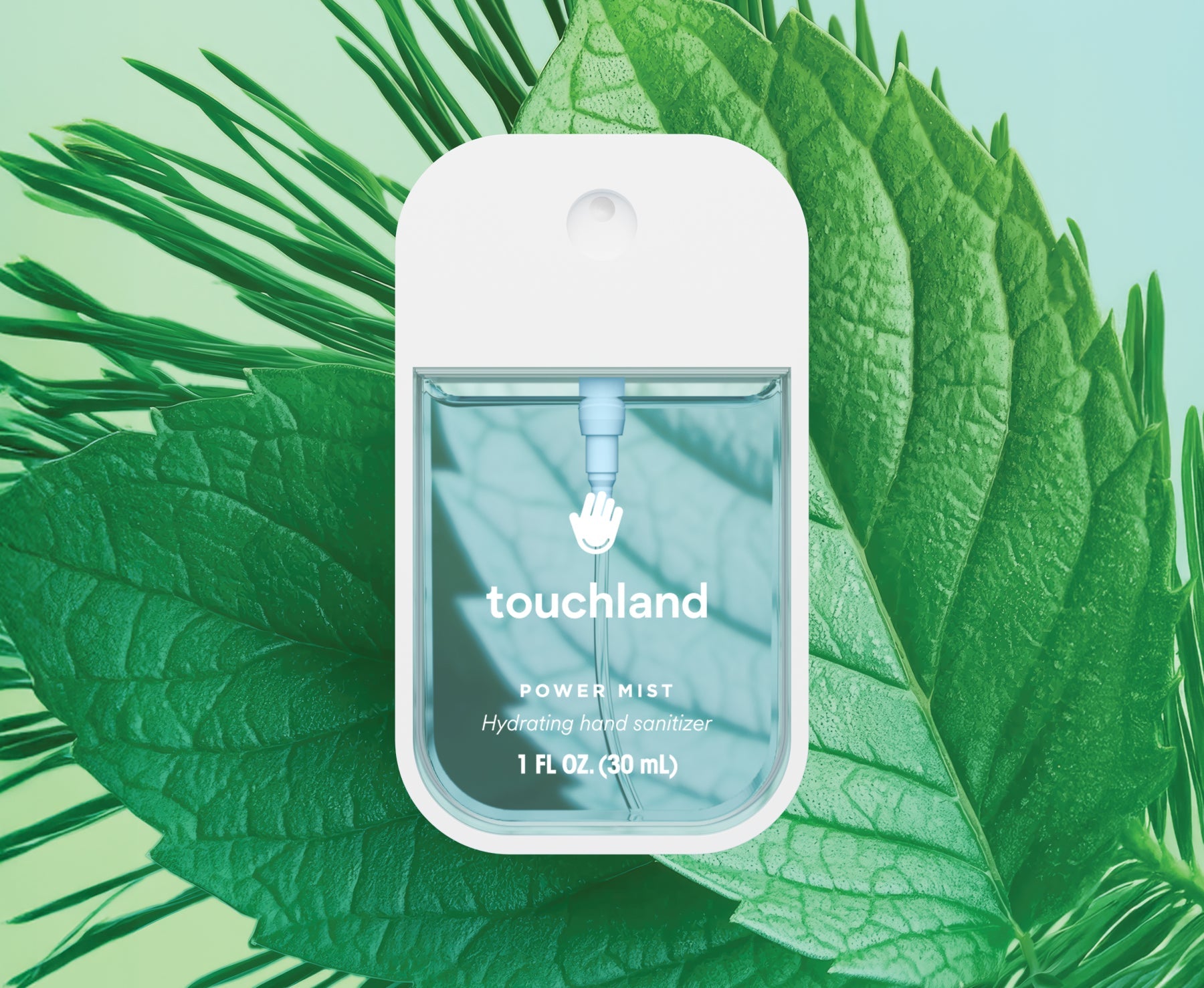 Touchland hand sanitizer packaging on a green leaf background. Available at Be Charmed