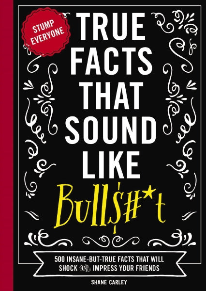 The cover of the book 'True Facts That Sound Like Bull' by Shane C. Adams features a black background with white text and decorative flourishes. Available at Be Charmed