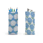 A fabric eyeglass/Accessory holder with a hydrangea flower pattern in blue and white colors. Available at Be Charmed