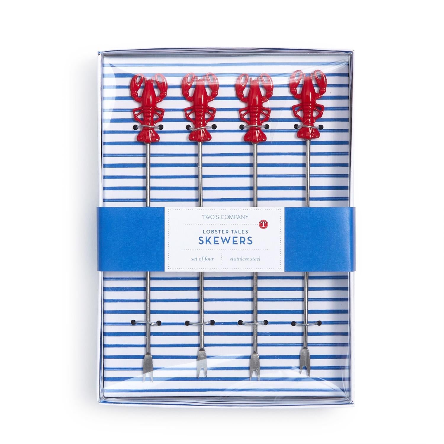 Set of lobster-shaped skewers in packaging with blue and white stripes. Available at Be Charmed