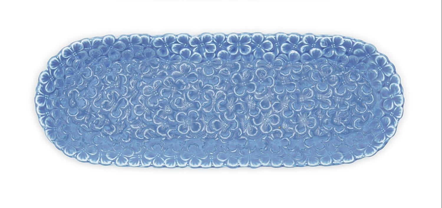 Blue textured rectangular tidbit/cracker dish on a white background. Available at Be Charmed
