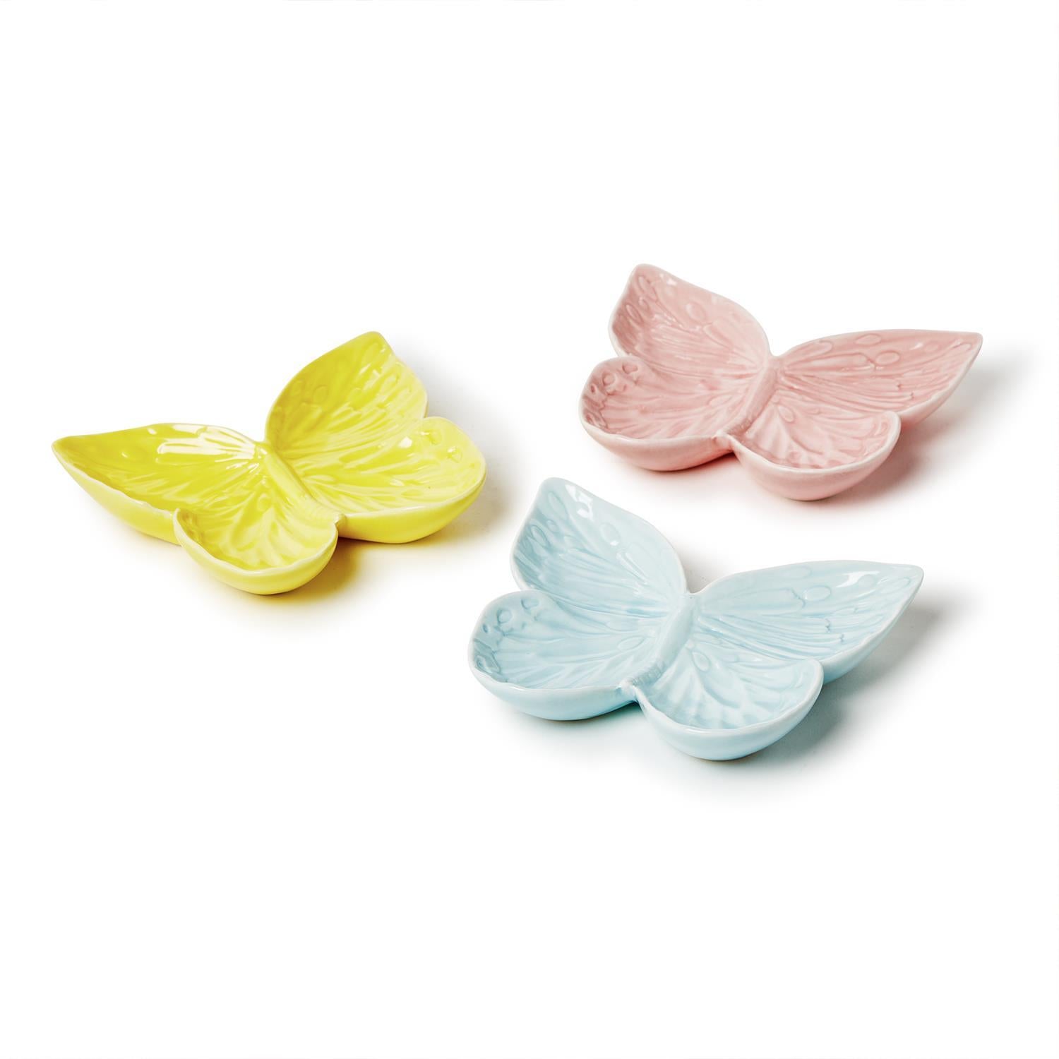 Three butterfly-shaped ceramic bowls in pastel colors on a white background. Available at Be Charmed