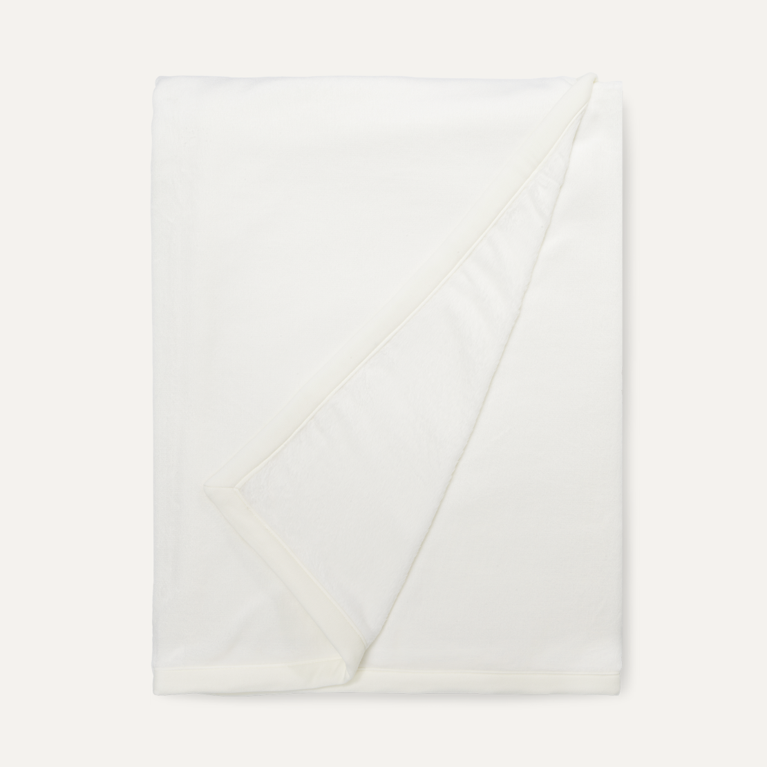UGG Cream Duffield II Throw Blanket ultra-soft double-sided plush fleece blanket, available at Be Charmed.