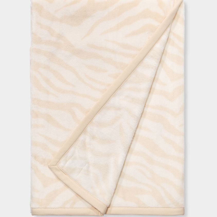 UGG White Zebra Duffield II Throw Blanket ultra-soft double-sided plush fleece blanket, available at Be Charmed.