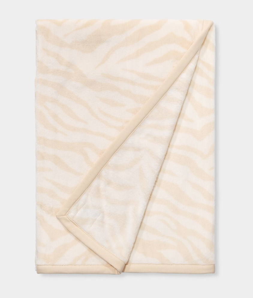 UGG White Zebra Duffield II Throw Blanket ultra-soft double-sided plush fleece blanket, available at Be Charmed.
