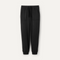 A pair of black UGG men's jogger pants with a drawstring waist and a brand tag on the lower left side. Available at Be Charmed