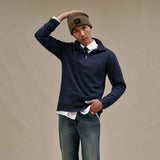 UGG Navy Men's Zeke half-zip pullover sweater in a soft cotton-blend fleece, available at Be Charmed.