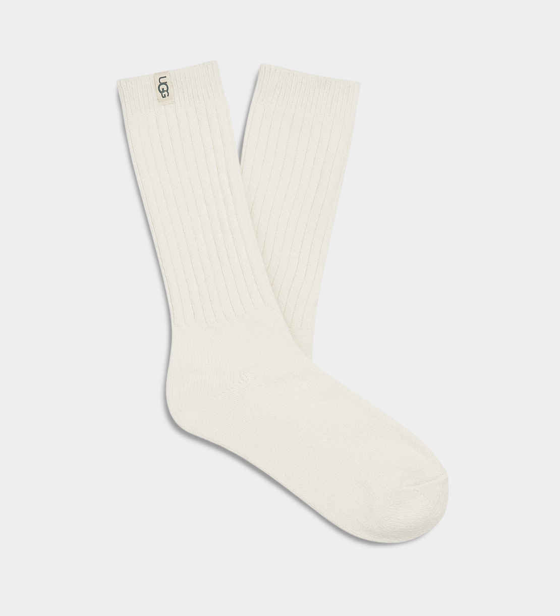 UGG Rib Knit White Slouchy Crew Sock – soft rib-knit women’s crew sock with relaxed slouchy fit. Available at Be Charmed. 