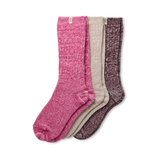 Three pairs of UGG rib knit slouchy socks in pink, beige, and brown on a white background. Available at Be Charmed.