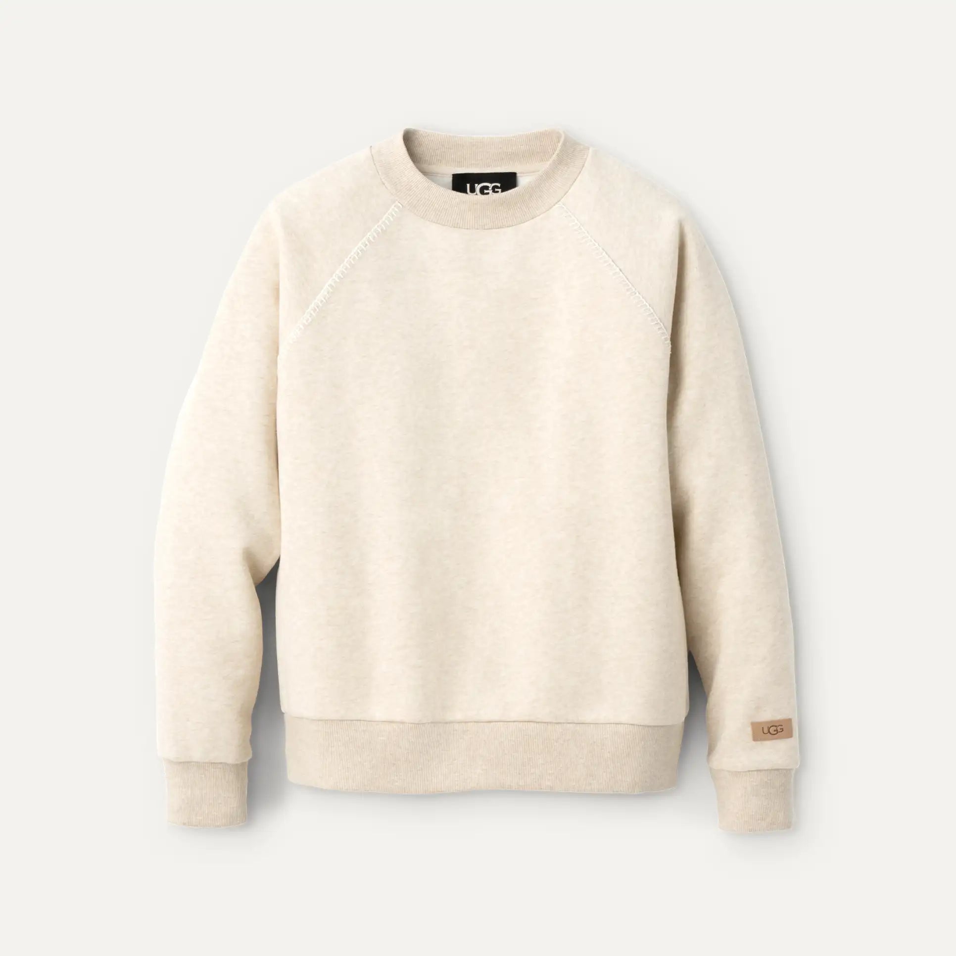 Beige sweatshirt with 'Lee' branding on a light gray background. Available at Be Charmed