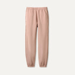 UGG Pink Dawn Patrol sweatpants on a light beige background. Available at Be Charmed. 