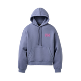 Blue hoodie with pink UGG logo on a white background. Available at Be Charmed. 