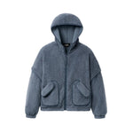 A dusty blue ugg sherpa fleece zip-up hoodie jacket with a drawstring hood and two large front patch pockets, shown flat on a light cream background. Available at Be Charmed