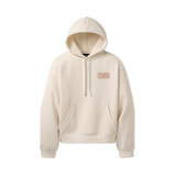 Beige hoodie with 'UGG' logo on a white background. Available at Be Charmed. 
